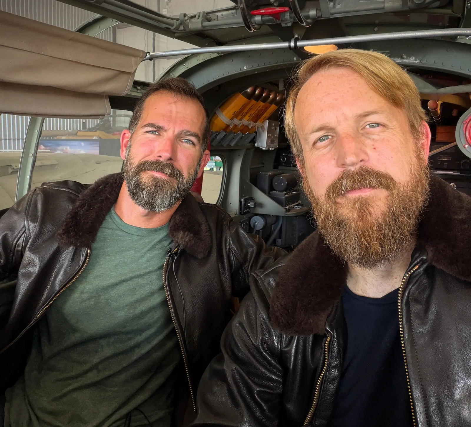 Kenneth Padgett and Justin Hughes in the cockpit of a WWII bomber